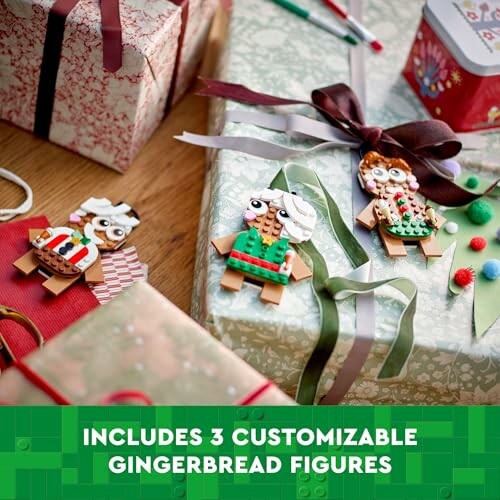 Gingerbread figures with gift boxes and holiday decorations.