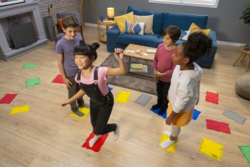 Children playing an indoor game with colorful mats in a living room.